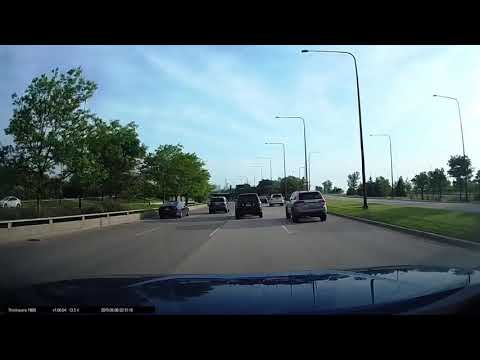 An idiot misses his exit and forces his way through