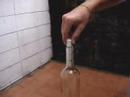 How to remove a cork from the bottom of an empty wine bottle?